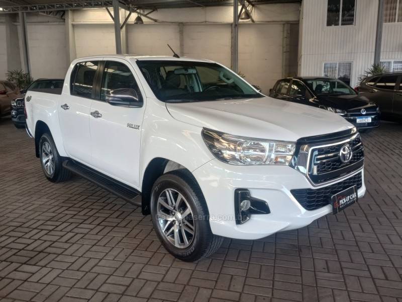 TOYOTA - HILUX - 2019/2020 - Branca - R$ 223.000,00