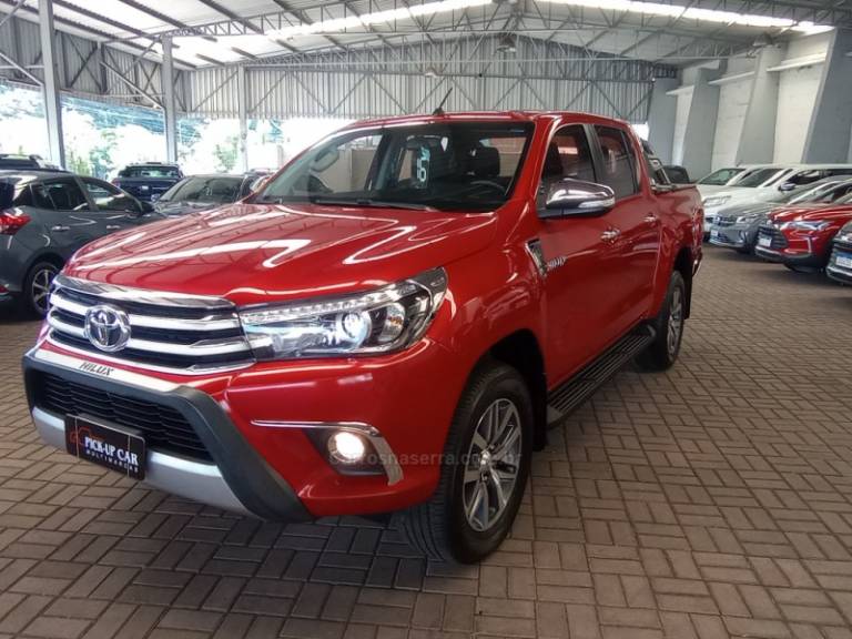 TOYOTA - HILUX - 2016/2016 - Vermelha - R$ 203.000,00