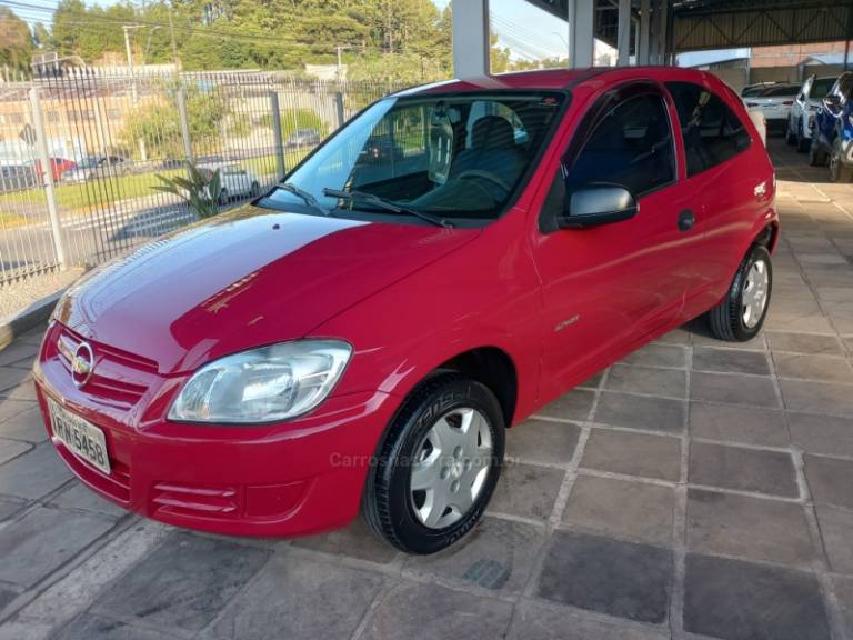 CHEVROLET - CELTA - 2010/2011 - Vermelha - R$ 24.000,00